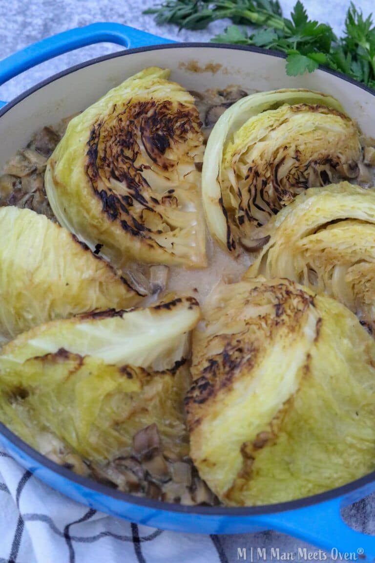 Cooked melting cabbage in a blue pot