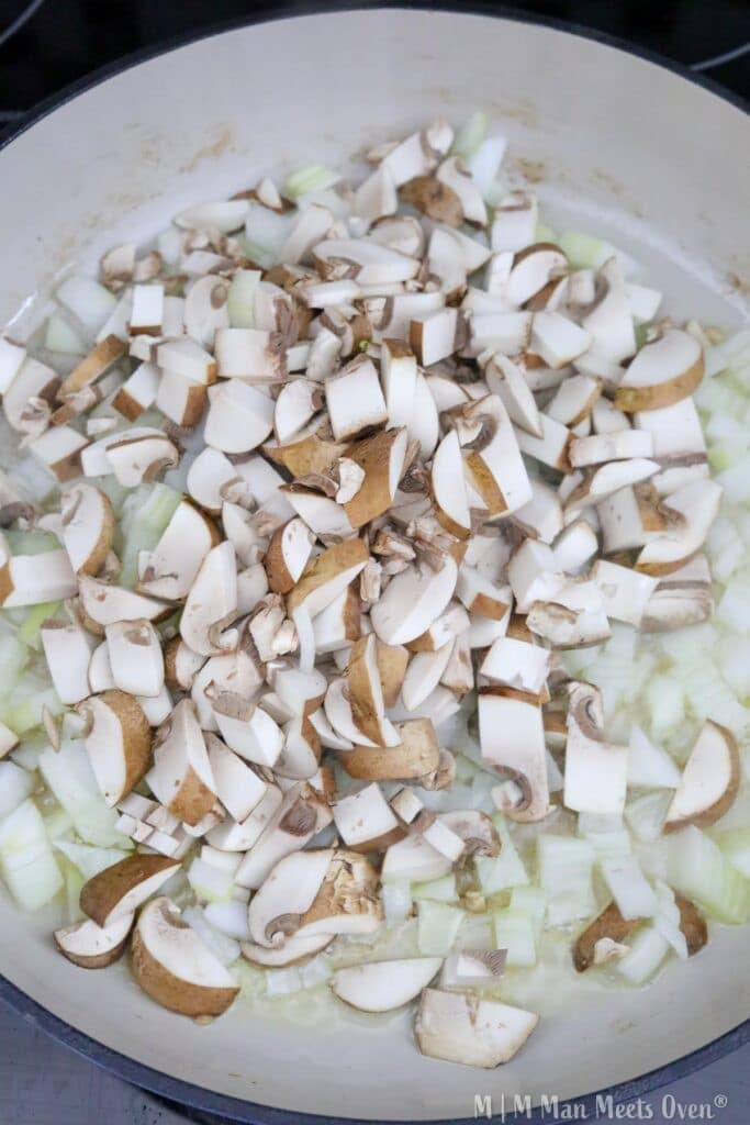 Mushrooms and onions in a pan