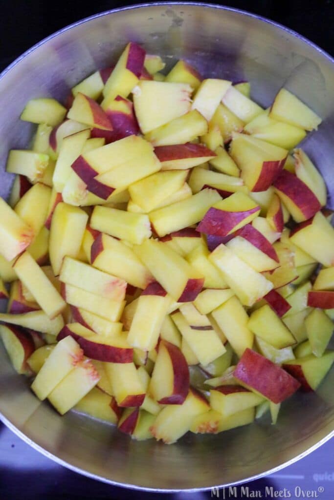 Diced peaches in a mixing bowl