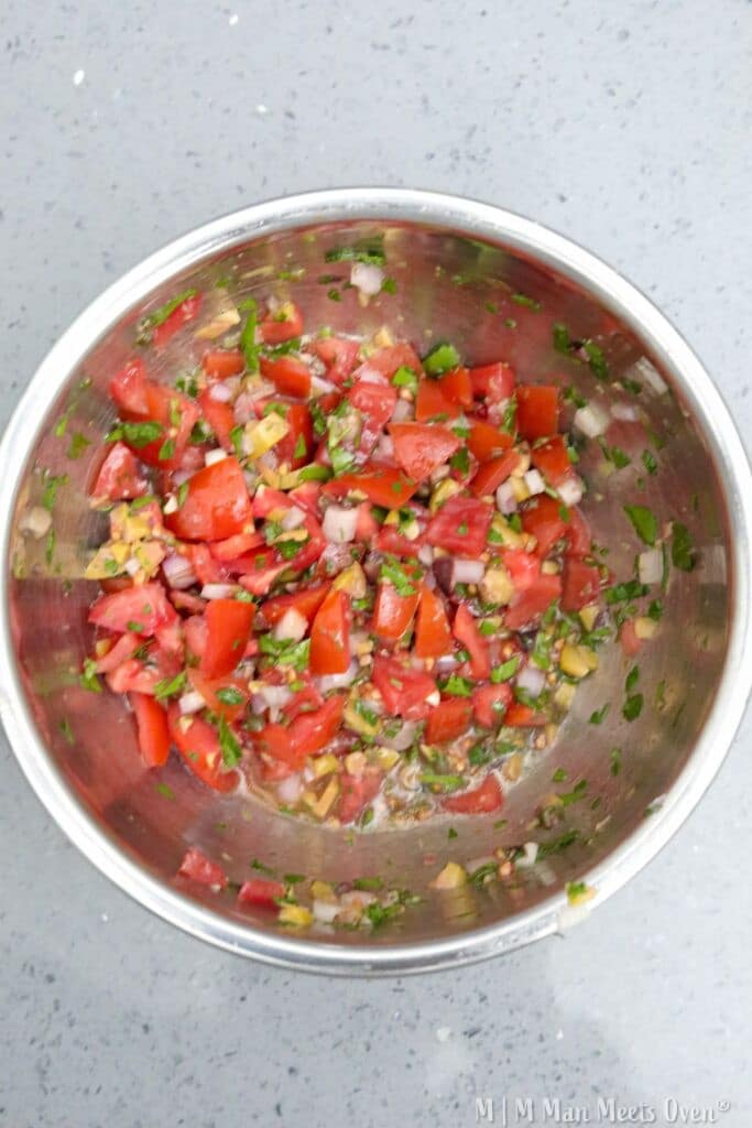 Colorful salsa in a mixing bowl