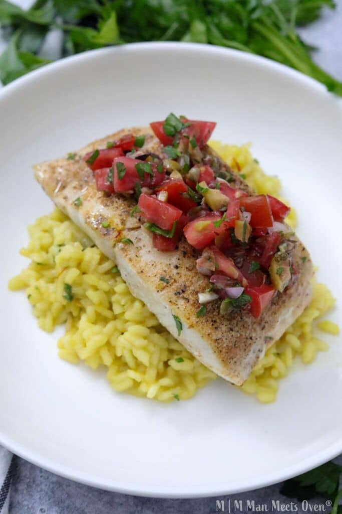 Seared halibut with tomato topping
