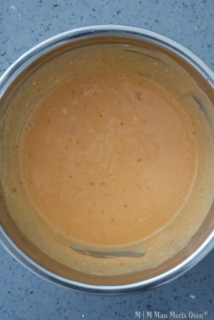 Creamy orange sauce in a bowl