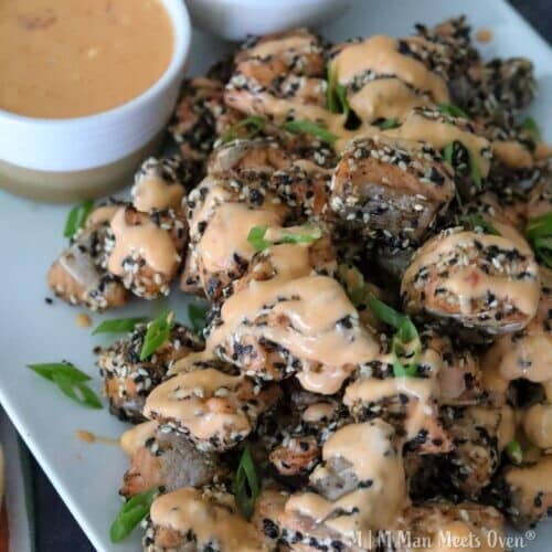 Fried salmon bites with sauce and rice
