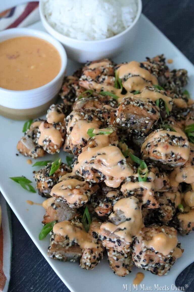 Fried salmon bites with sauce and rice