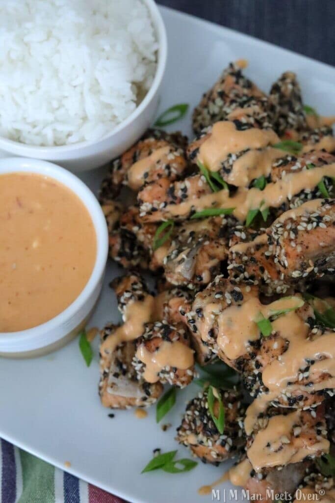 Salmon nuggets with rice and sauce